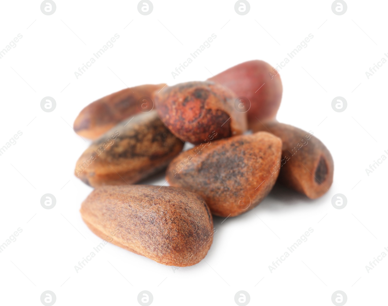 Photo of Pine nuts on white background. Healthy snack