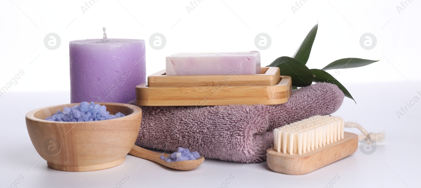 Photo of Composition with spa products and candle isolated on white