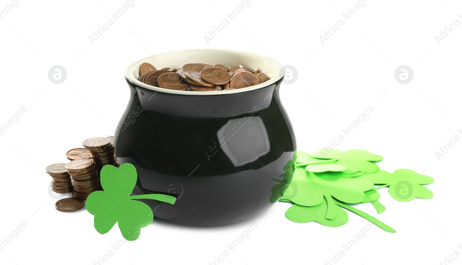 Photo of Pot of gold coins and clover on white background. St. Patrick's Day celebration