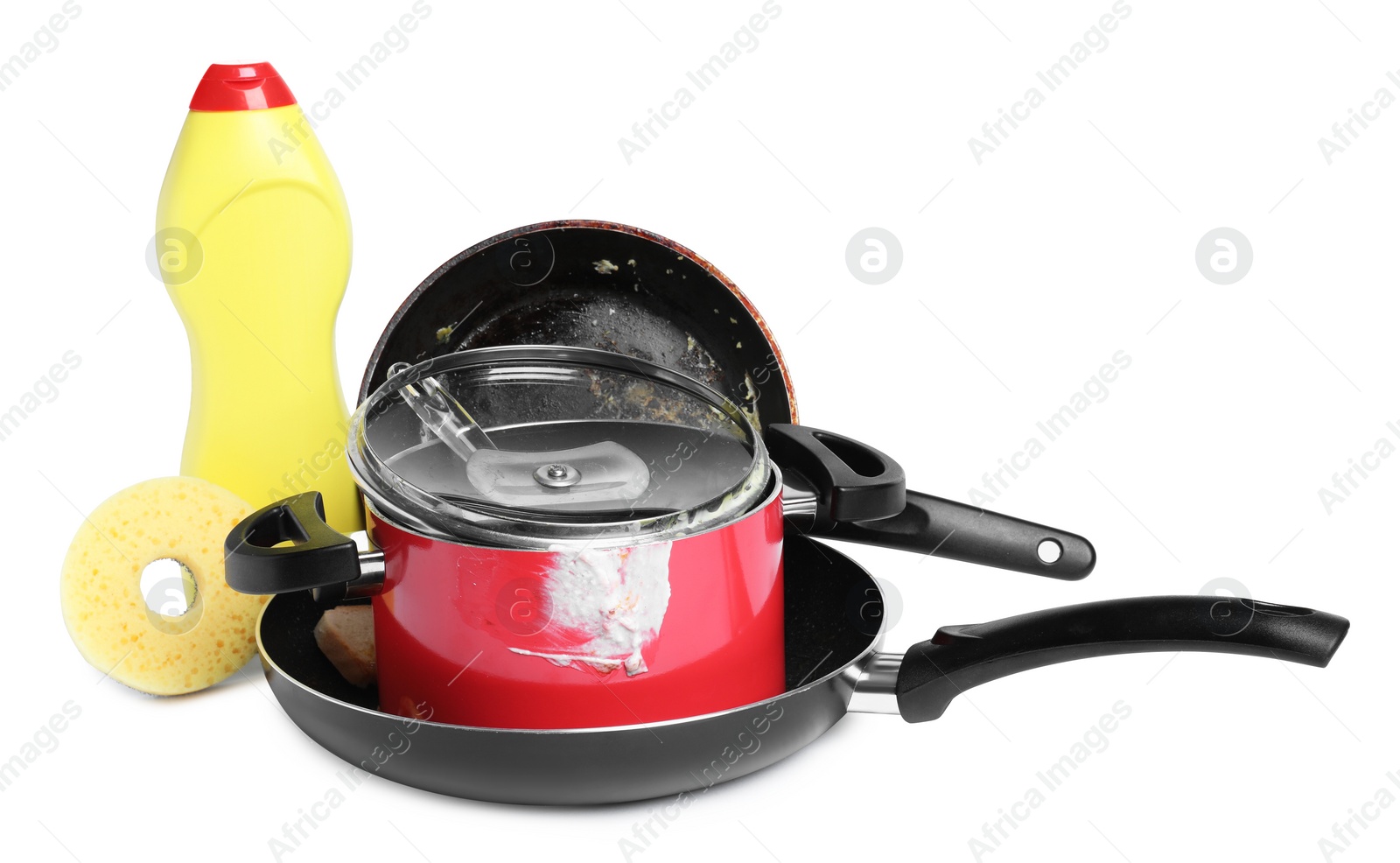 Photo of Stack of dirty kitchenware, dish detergent and sponge on white background