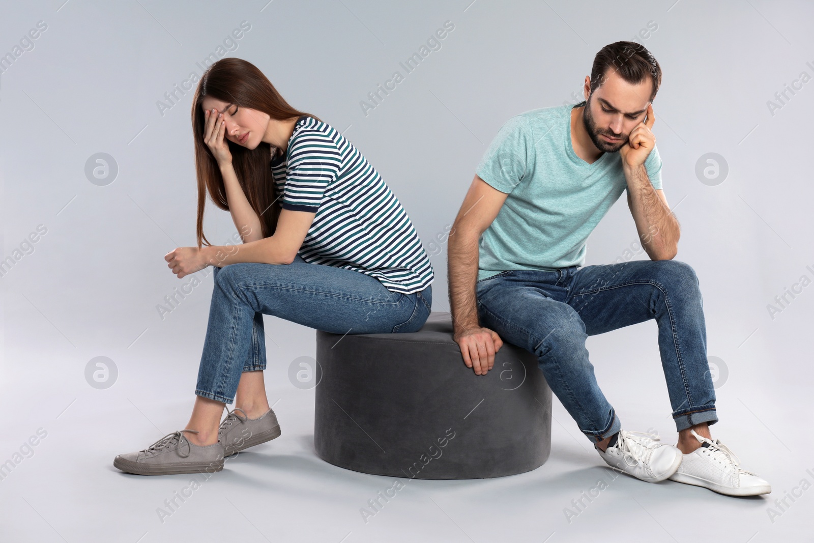 Photo of Couple with relationship problems on light grey background