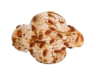Photo of Delicious Italian Easter dove cake (Colomba di Pasqua) decorated with sugar and almonds on white background, top view