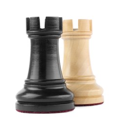 Photo of Different rooks on white background. Chess pieces