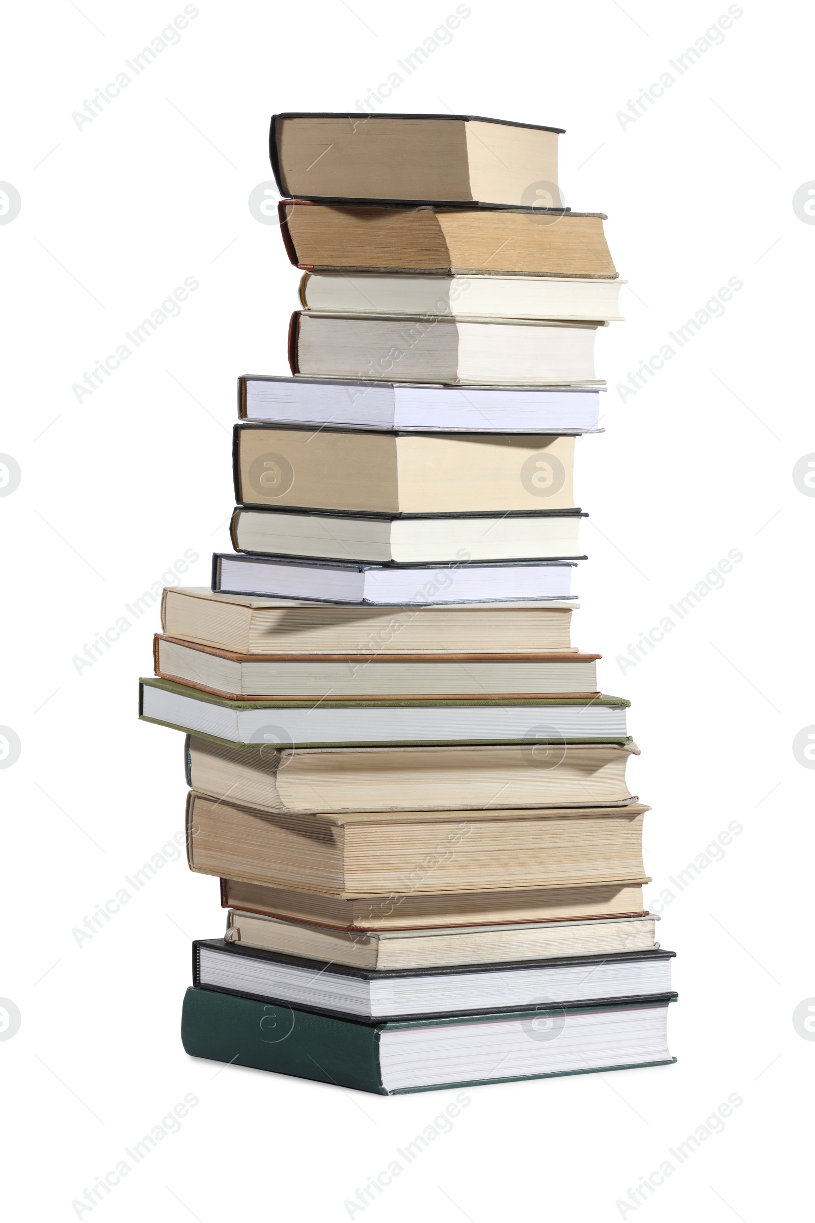 Photo of High stack of many different books isolated on white