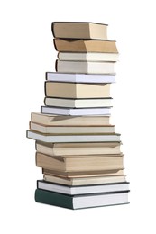 Photo of High stack of many different books isolated on white