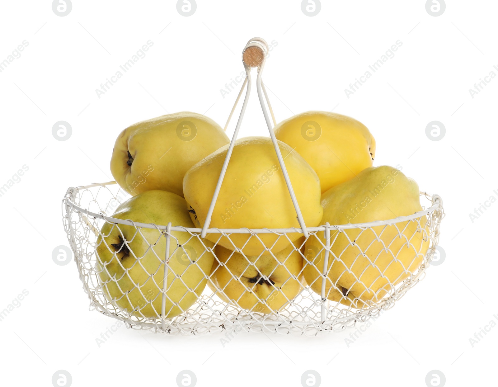 Photo of Fresh ripe quinces in basket on white background