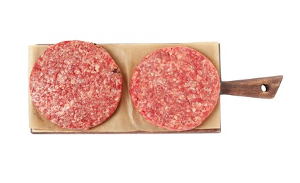 Photo of Raw hamburger patties and wooden board on white background, top view