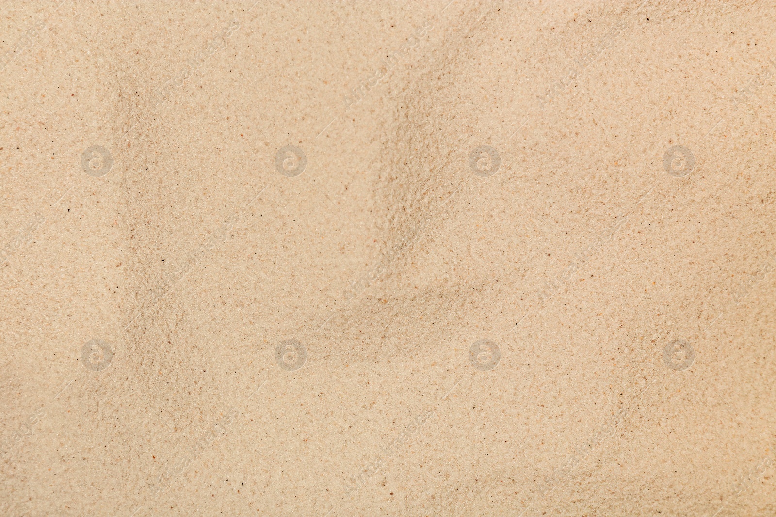 Photo of Dry beach sand as background, top view