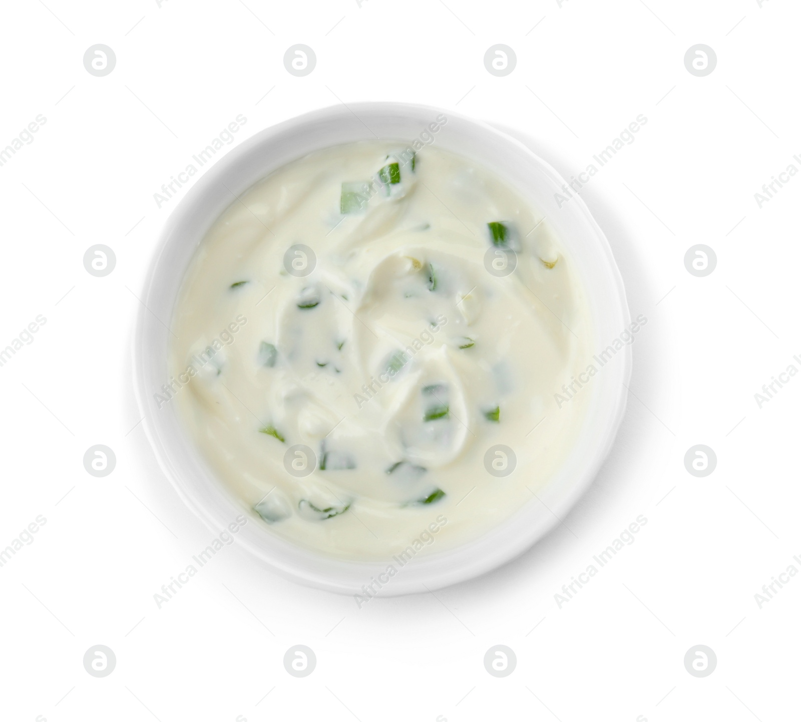 Photo of Bowl with sour cream and herbs on white background, top view