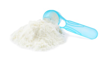 Powdered infant formula and scoop on white background. Baby milk