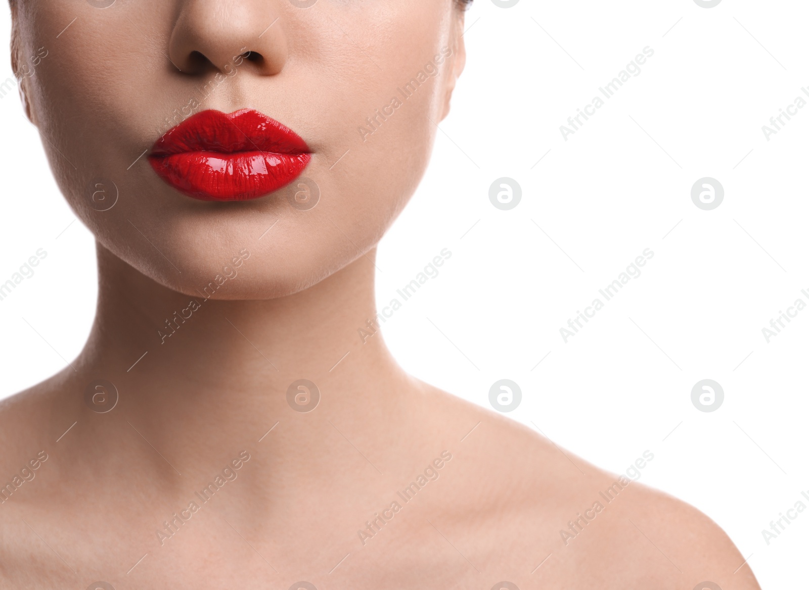 Photo of Closeup view of beautiful woman puckering lips for kiss on white background