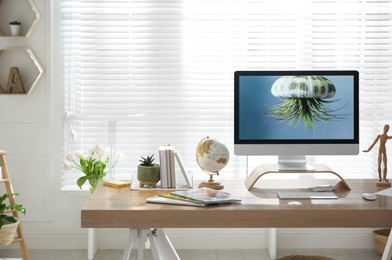 Stylish home office interior with comfortable workplace