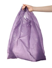 Woman holding purple plastic bag on white background, closeup