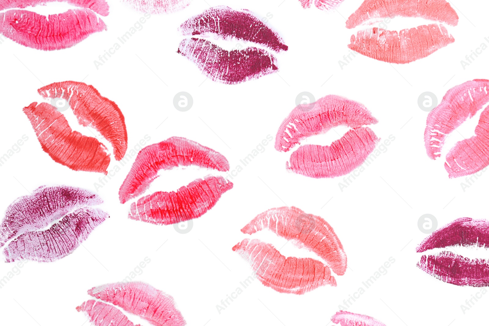 Photo of Lipstick kiss marks, isolated on white