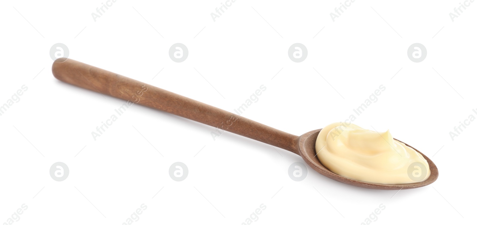 Photo of Wooden spoon with tasty mayonnaise isolated on white