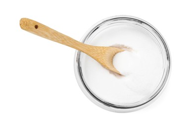 Photo of Baking soda and spoon in glass jar isolated on white, top view