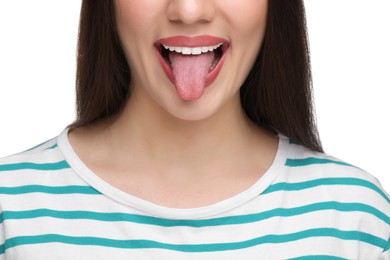 Woman showing her tongue on white background, closeup