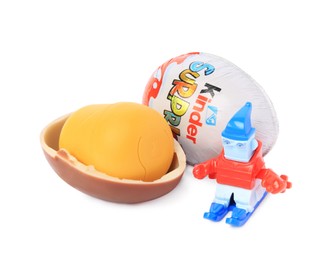 Photo of Slynchev Bryag, Bulgaria - May 23, 2023: Kinder Surprise Eggs, plastic capsule and toy on white background