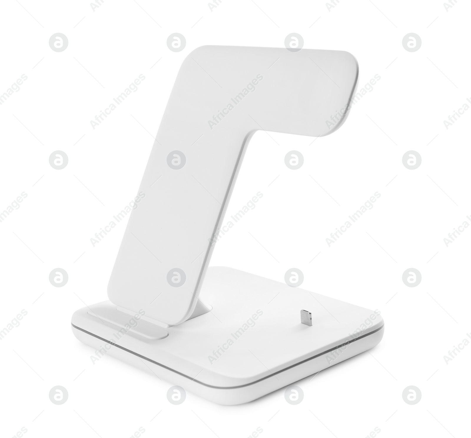 Photo of Wireless charger isolated on white. Modern technology