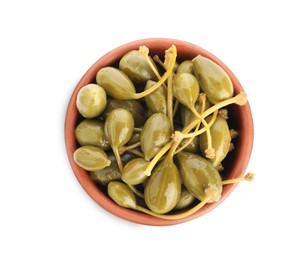 Capers in bowl isolated on white, top view