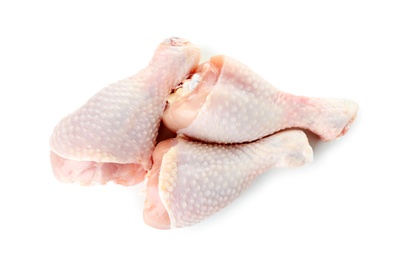 Raw chicken drumsticks on white background, top view. Fresh meat