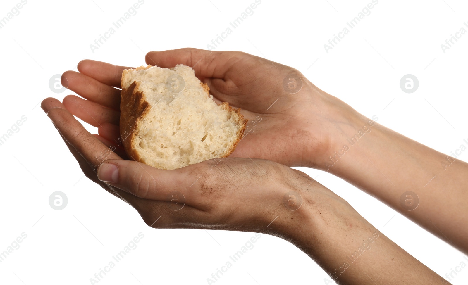 Photo of Poor woman holding piece of bread on white background, closeup