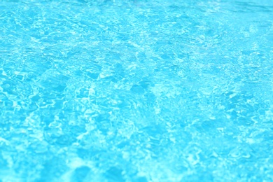 Photo of Surface of swimming pool with clean blue water, closeup
