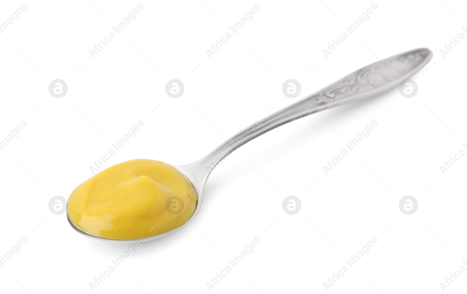 Photo of Spoon of tasty curry sauce isolated on white