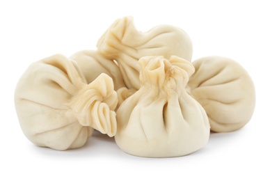 Photo of Boiled dumplings with tasty filling on white background