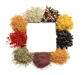Frame made of different aromatic spices on white background, top view with space for text
