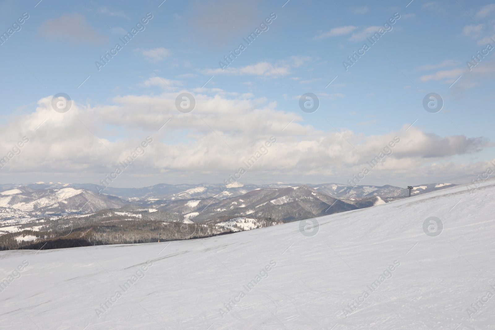 Photo of Picturesque mountain landscape with snowy hills in winter