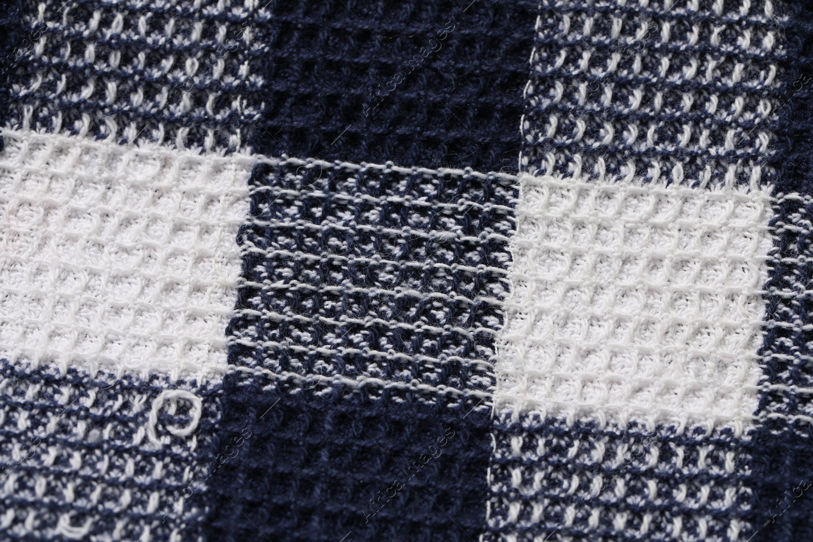 Photo of Texture of checkered fabric as background, top view