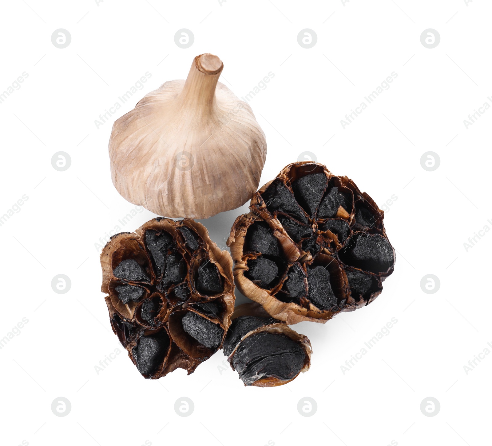 Photo of Organic fermented black garlic isolated on white, top view
