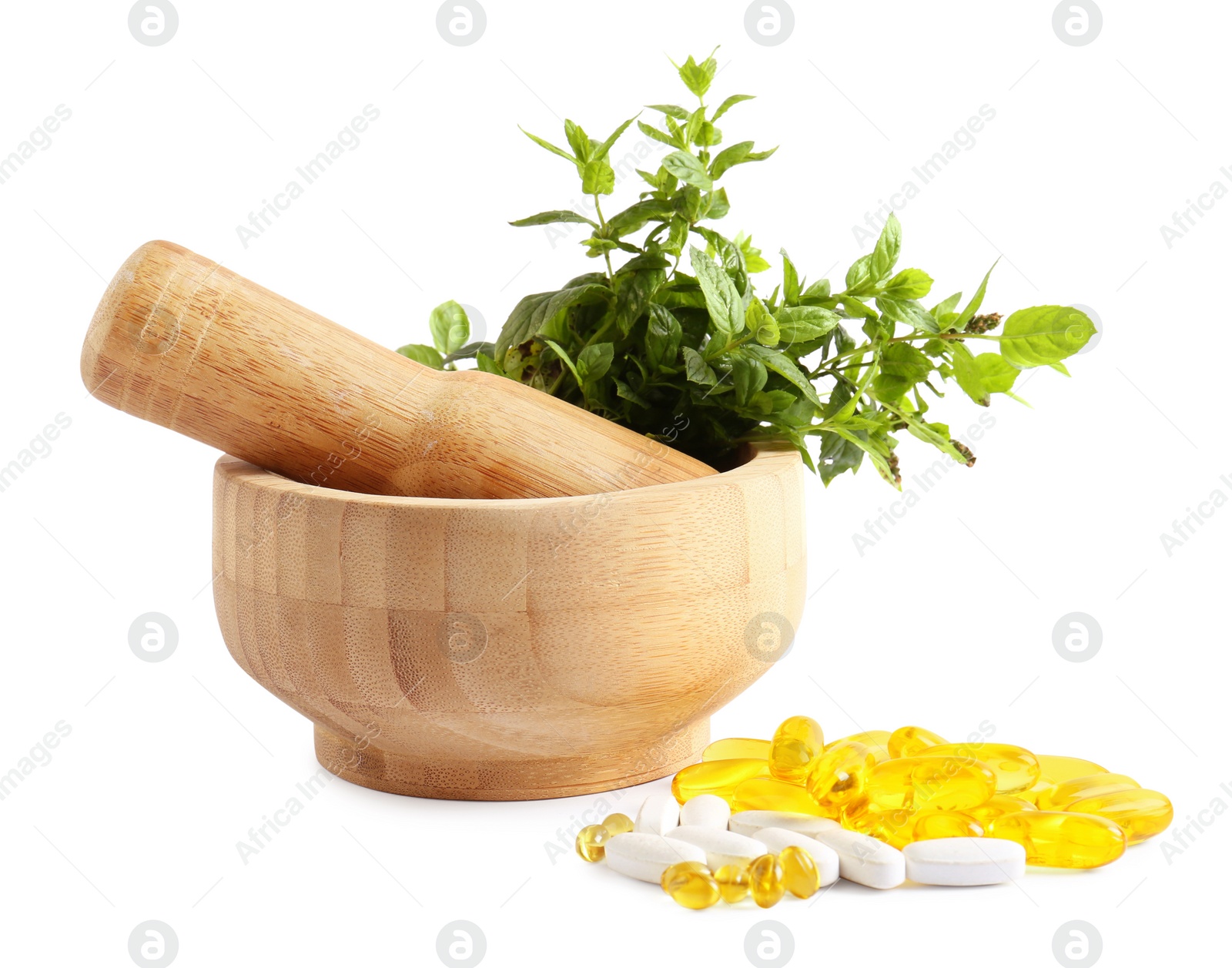 Photo of Mortar with fresh green mint and pills on white background