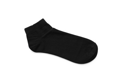 Photo of Black sock isolated on white, top view