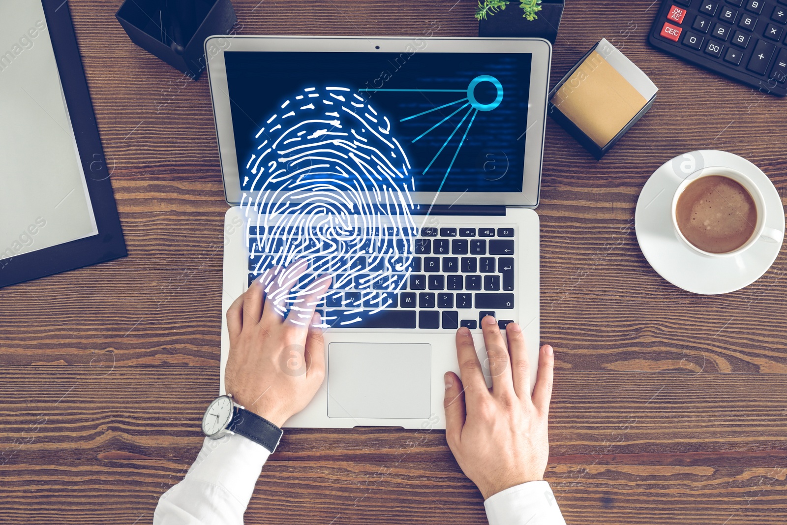 Image of Fingerprint identification. Man working with laptop at table, top view