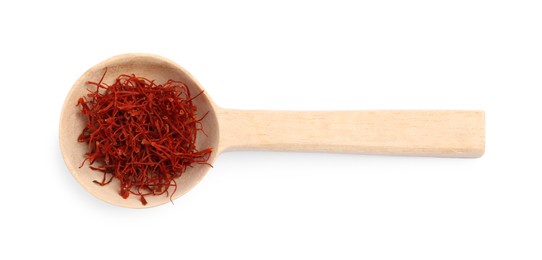 Photo of Wooden spoon of dried red saffron isolated on white, top view