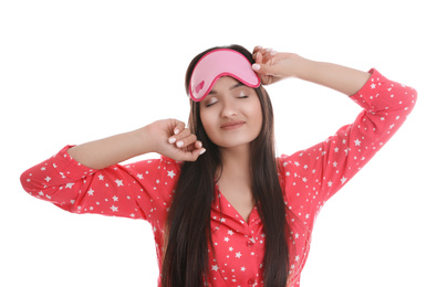 Beautiful woman wearing sleeping mask on white background. Bedtime