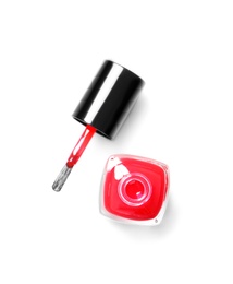 Bottle of color nail polish with brush on white background, top view