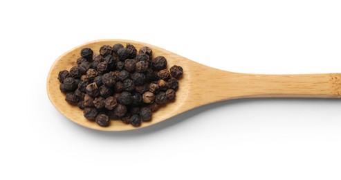 Photo of Aromatic spice. Many black peppercorns in spoon isolated on white, top view