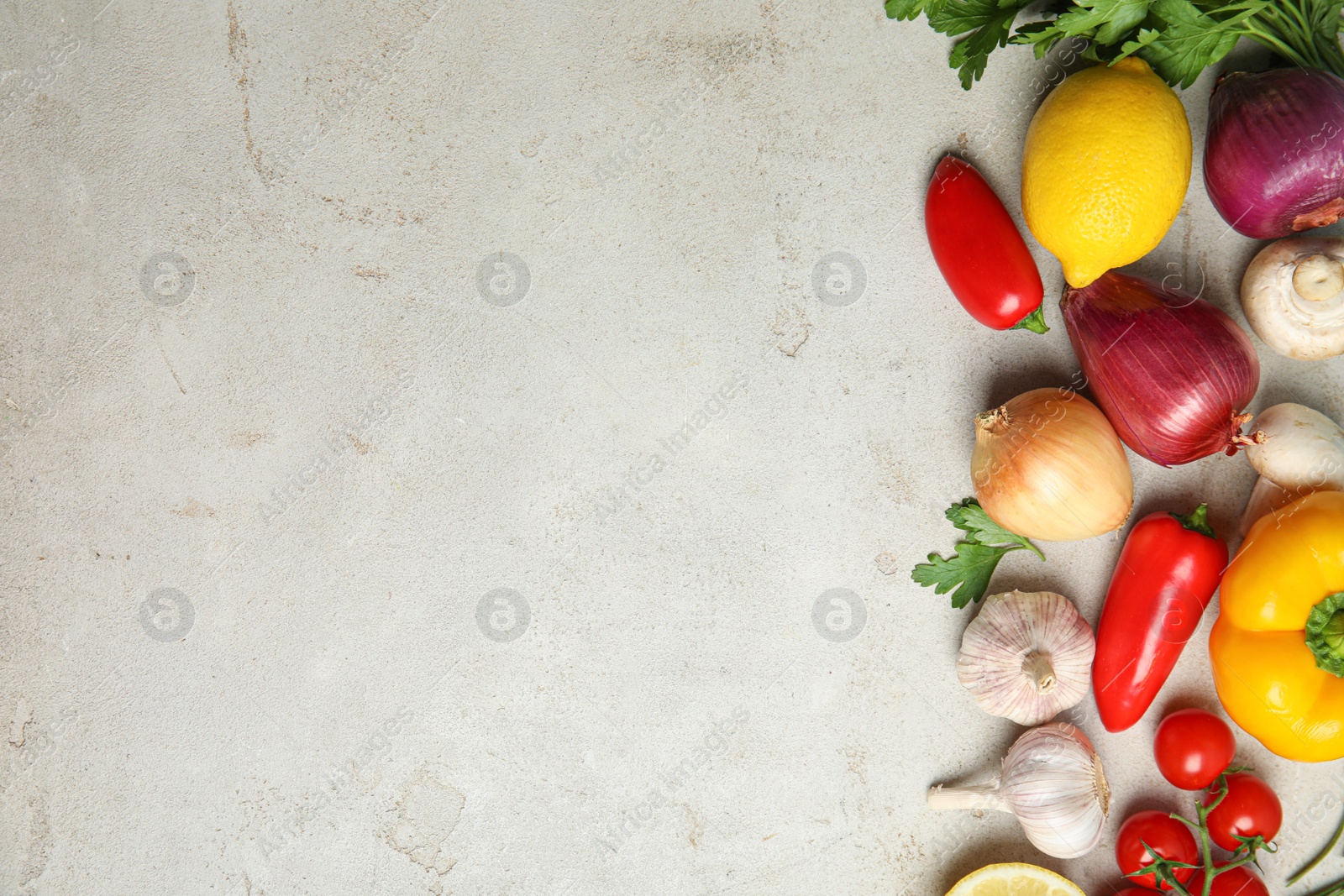 Photo of Flat lay composition with ingredients for cooking on light table. Space for text