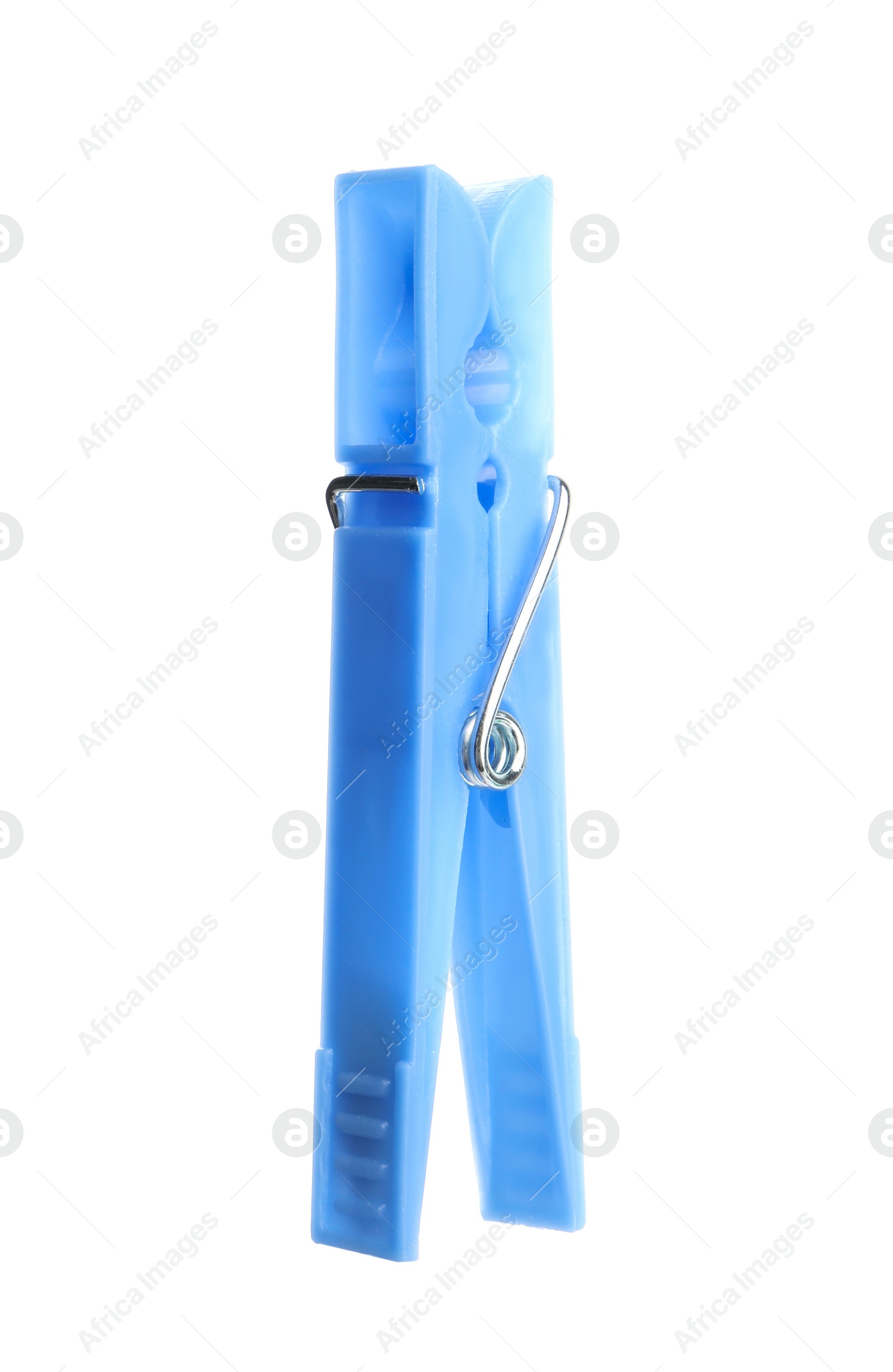 Photo of Bright light blue plastic clothespin isolated on white