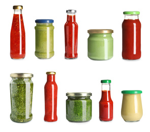 Image of Set with delicious sauces in glassware on white background