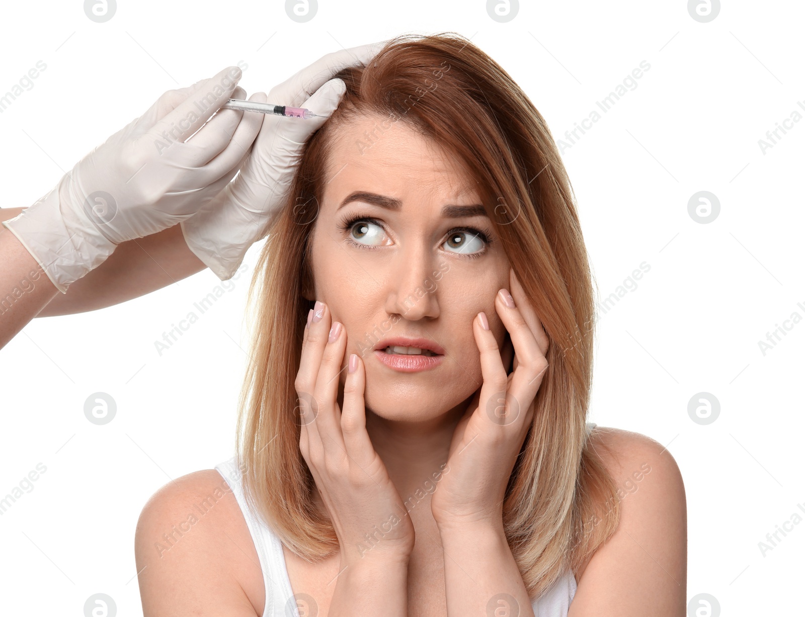 Photo of Young woman with hair loss problem receiving injection, on white background