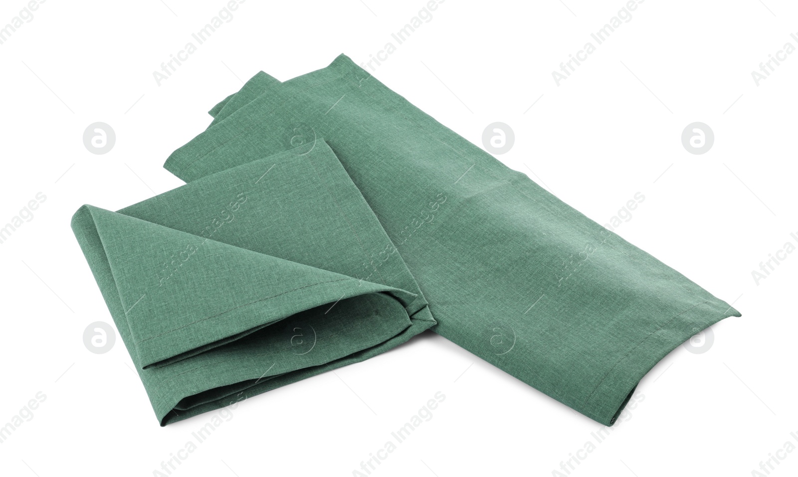 Photo of Green cloth kitchen napkins isolated on white