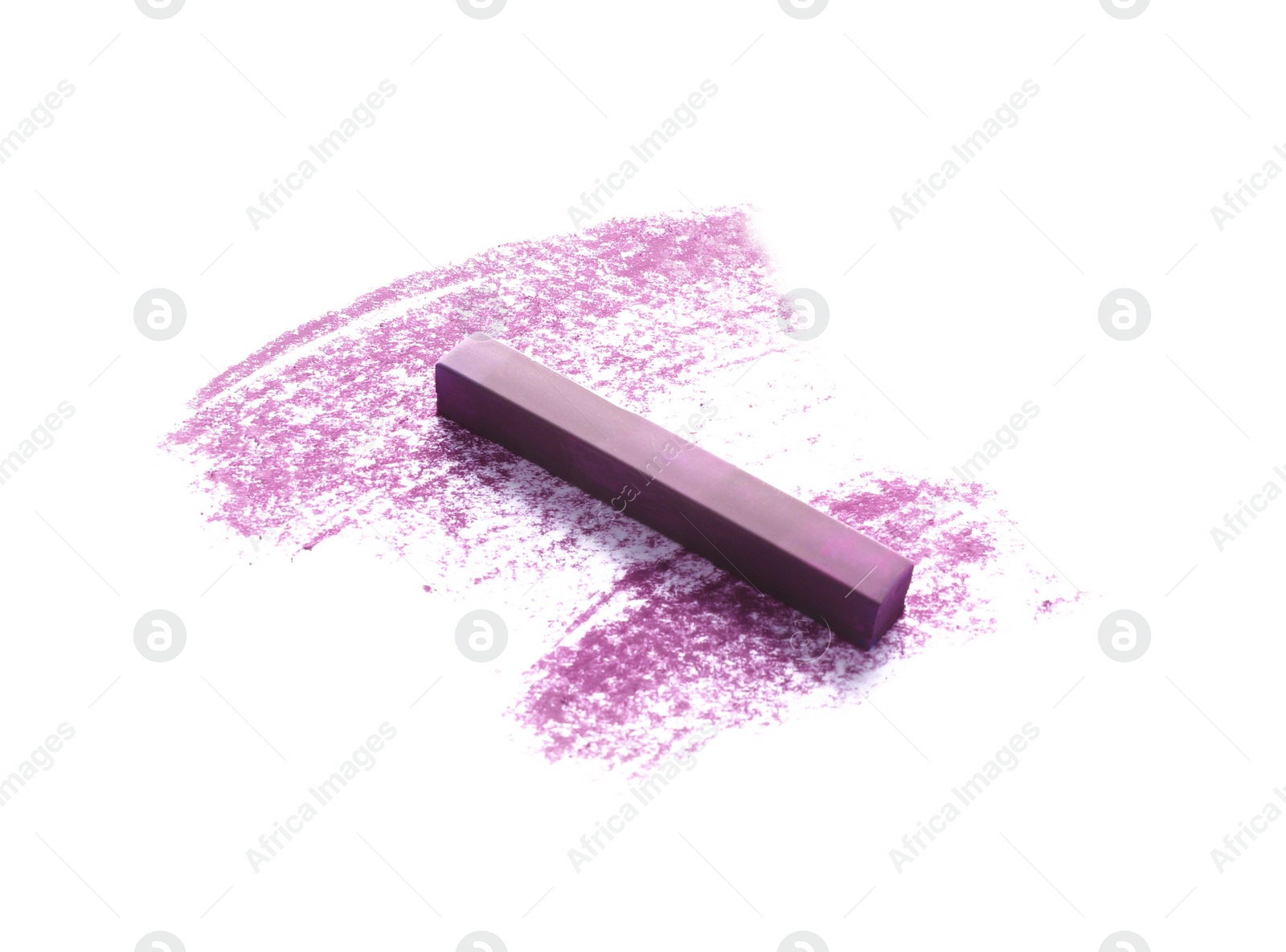 Photo of Purple pastel chalk on sheet of paper with scribble. Drawing material