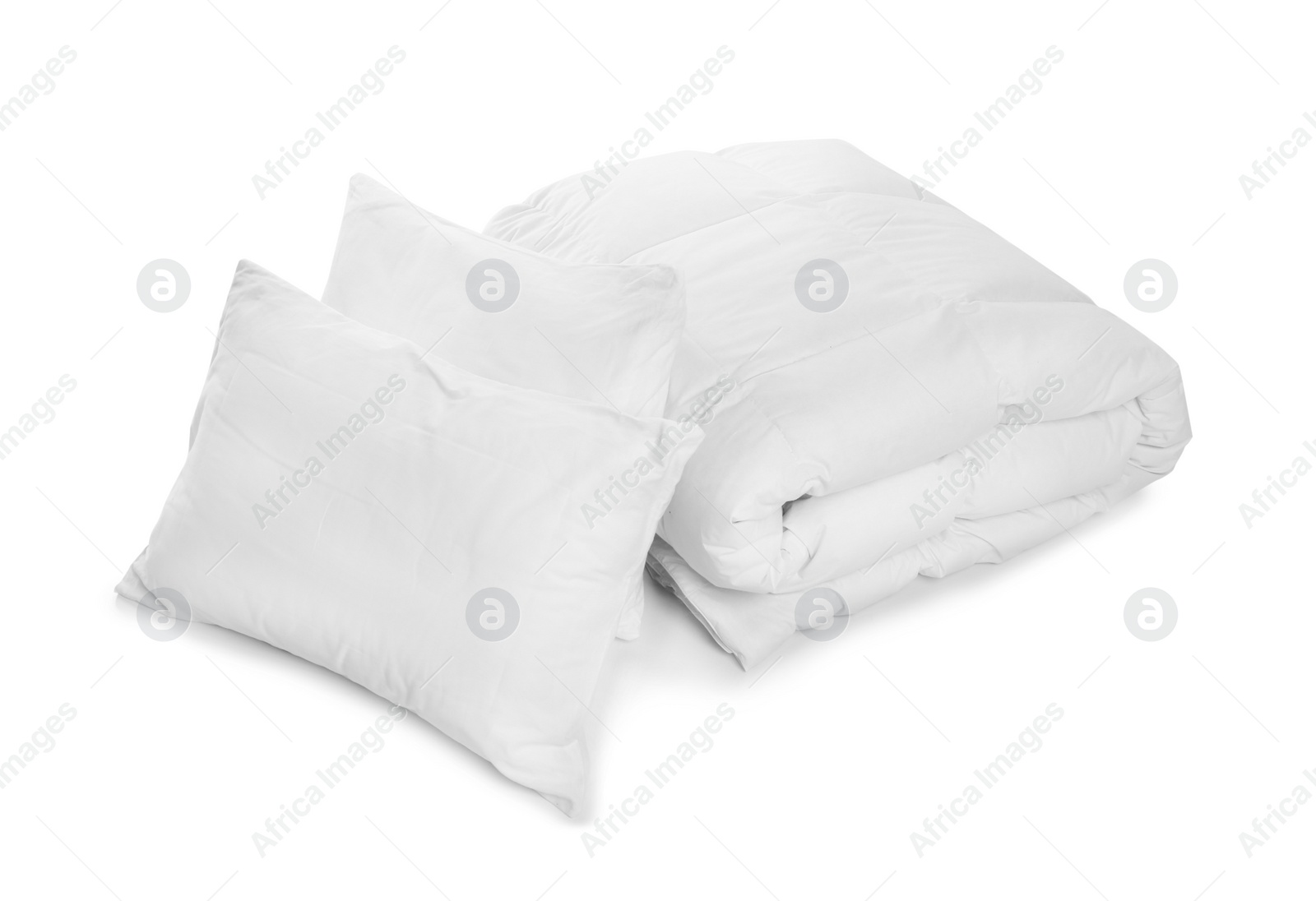 Photo of Clean blanket and pillows on white background