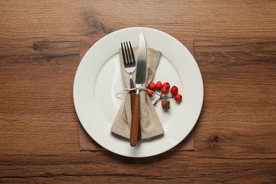 Photo of Stylish autumn table setting on wooden background, flat lay