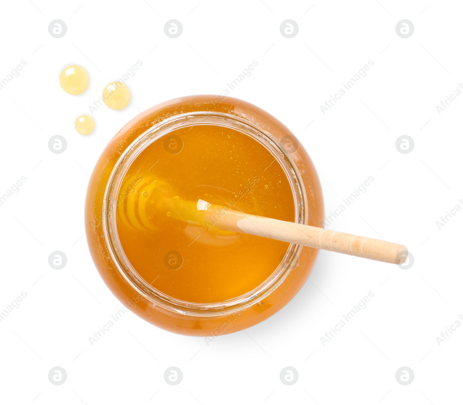 Photo of Tasty honey and dipper in glass jar isolated on white, top view