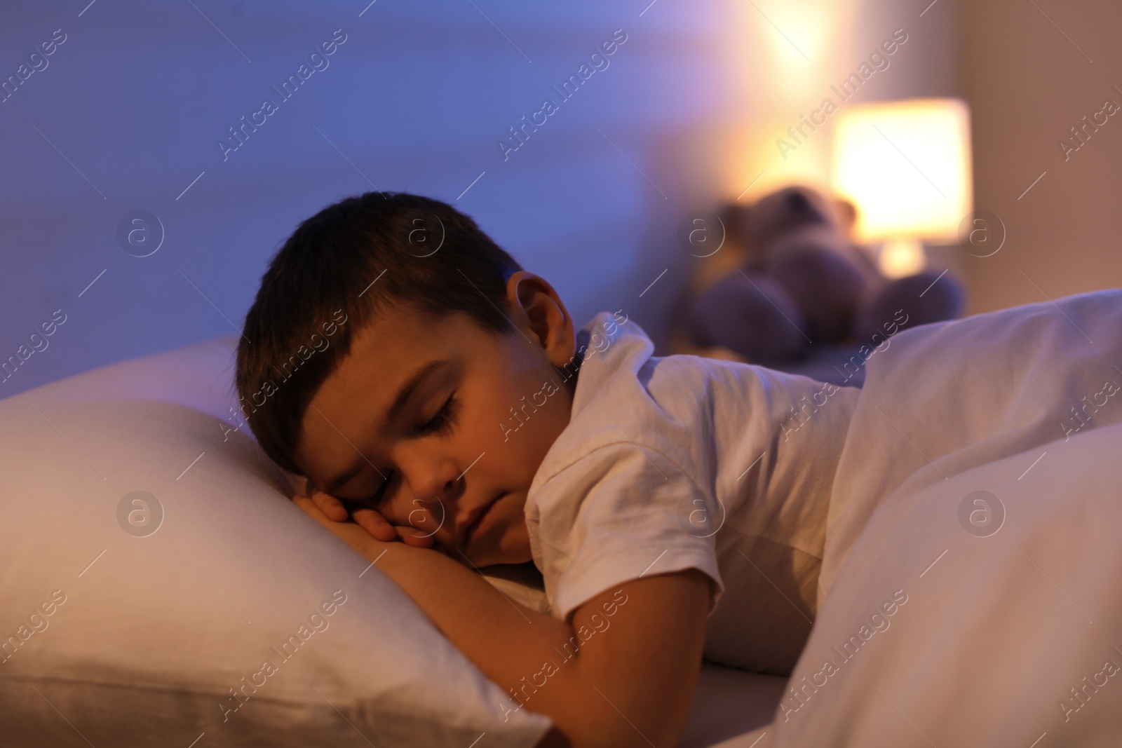 Photo of Cute little boy sleeping at home. Bedtime